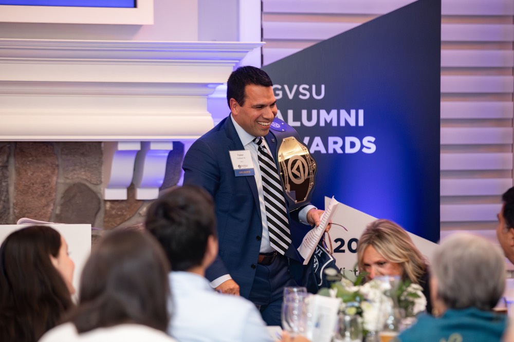 Victor Cardenas walking back to his seat